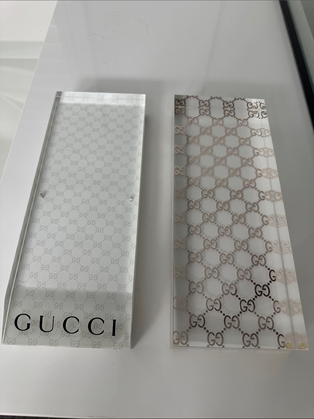 Gucci Clear Acrylic Vanity displays with GG Motif